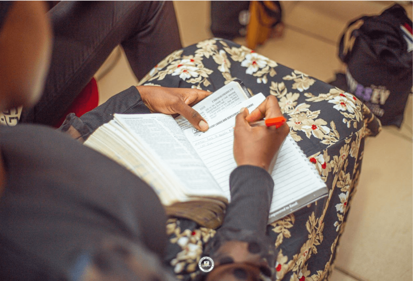 mountain top university students reading praying